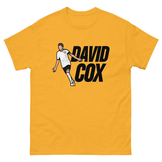 Gold t-shirt featuring artwork of David Cox.